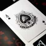 An Ace of Spades appears face up amidst face down cards.