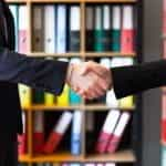 Two businesspeople shaking hands.