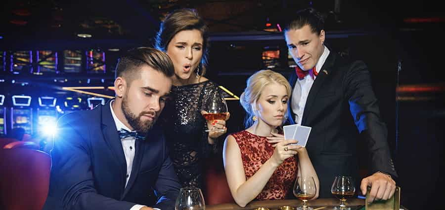 Two men and two women in a casino.