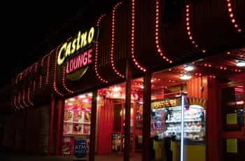 Neon signs indicate a casino location.